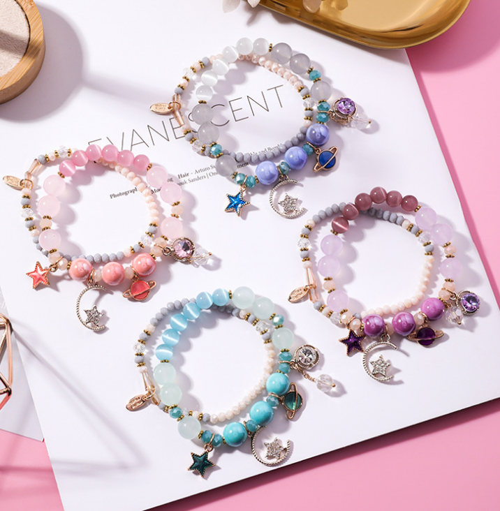 Crystal Bracelet with Star, Moon, and Cat Eye Design