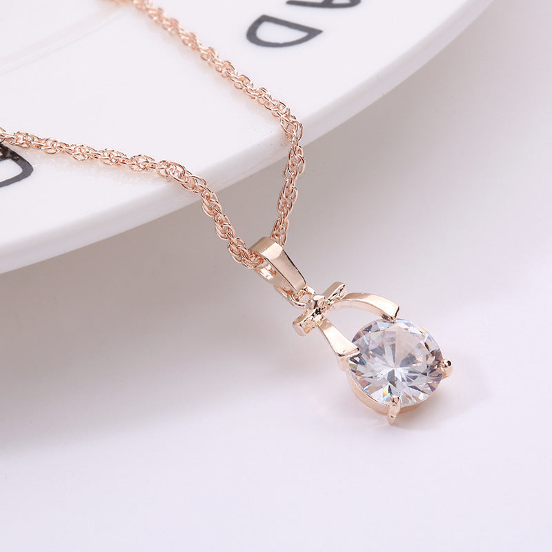 Crystal Earring Jewelry Set with Gold Bow Pendant