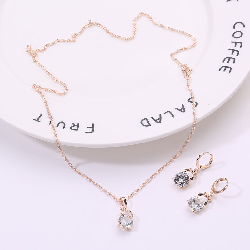 Crystal Earring Jewelry Set with Gold Bow Pendant