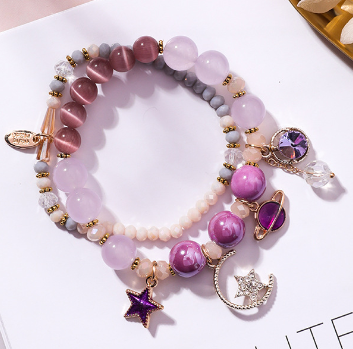 Crystal Bracelet with Star, Moon, and Cat Eye Design