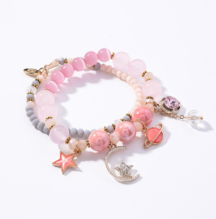 Crystal Bracelet with Star, Moon, and Cat Eye Design